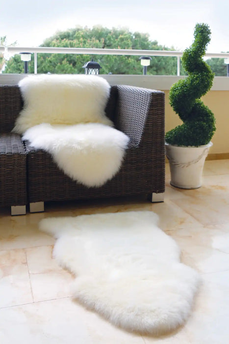 Origins sheepskins hug natural Ivory Living Room Wool Rug.