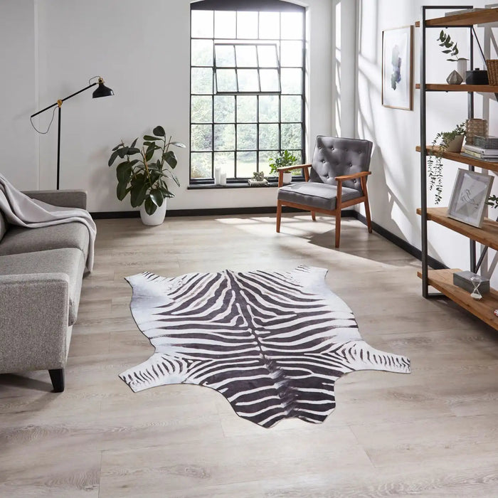 Think Rugs faux animal print zebra print Black, Ivory Living Room Rug.
