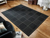 checked flatweave black    Rug.