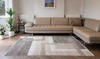 Is this rug really shades of grey because it looks like shades of brown and cream?