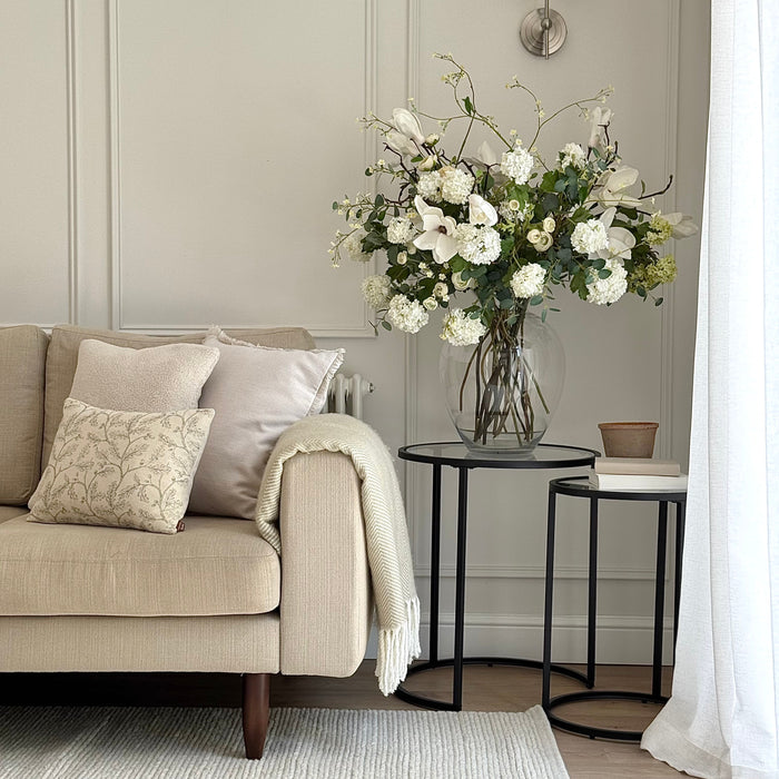 White woven rug in modern living room. 