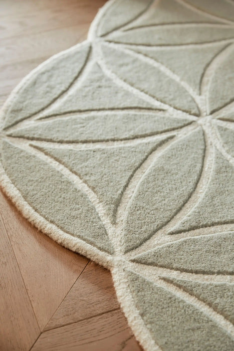 Origins bloom soft green Green Living Room Wool Rug.