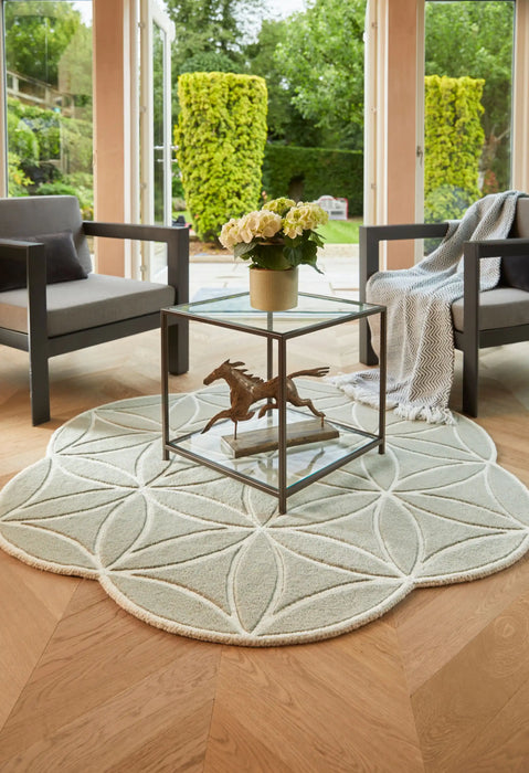 Origins bloom soft green Green Living Room Wool Rug.
