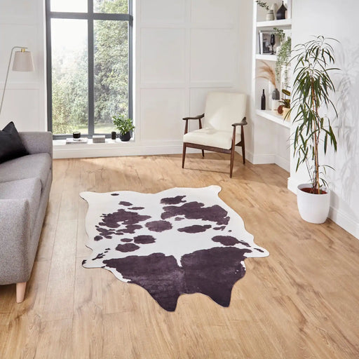 Think Rugs faux animal print cow print black and white Black, Ivory Living Room  Rug.