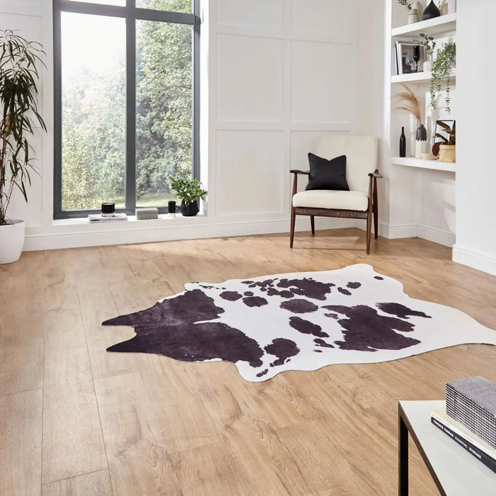 Think Rugs faux animal print cow print black and white Black, Ivory Living Room  Rug.
