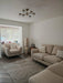 Photo By Michael R. | Living room with beige sofa, armchair, and GRU01 Grey rug