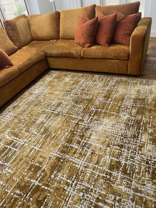 Photo by Andy, | Asiatic kuza abstract gold Living Room  Rug.