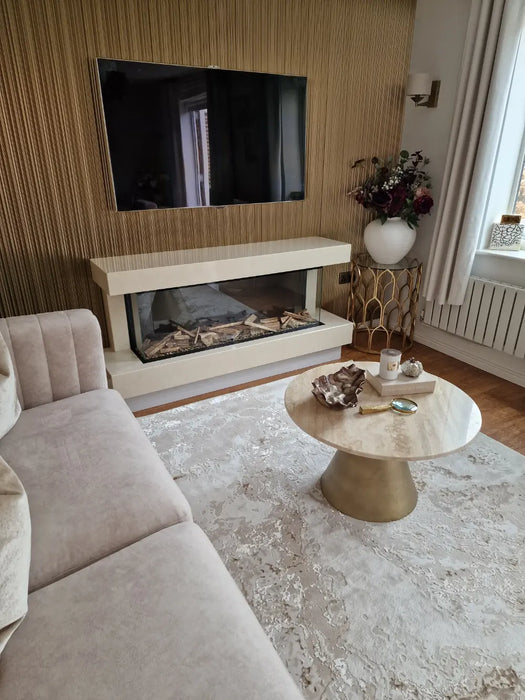 Photo by @rebeccasglamhome |Living room with a sofa, coffee table, and fireplace.