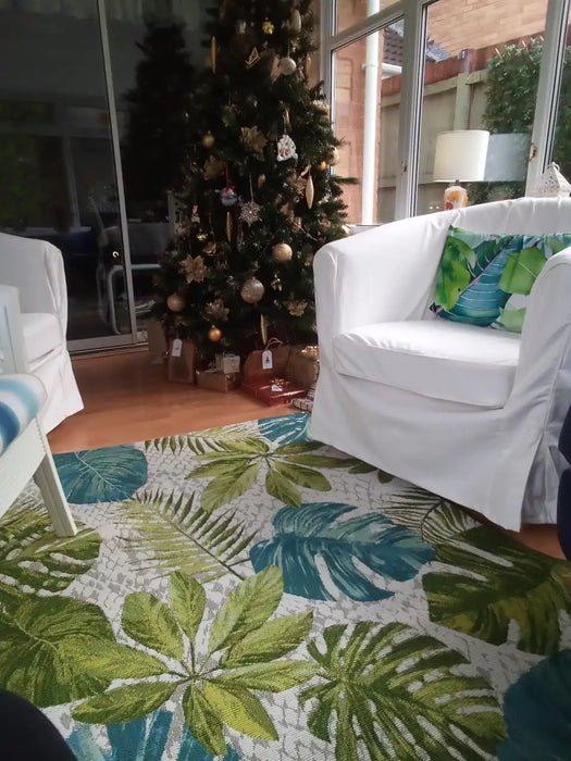 Photo by Debbie, | Hanse Home flair tropical leaves turqouise green Living Room Floral Rug.