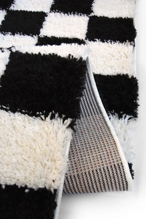  snug melrose checks mono    Rug.