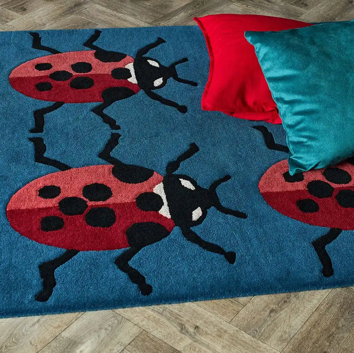 Woven Edge natural world ladybird Blue, Multicoloured, Red Living Room Wool Rug.